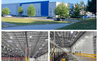 Exterior of a modern blue-accented commercial building with trees and a curved road leading to a parking lot under a clear sky, daytime view.